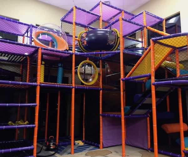 Go Play Systems Custom Design: Twenty foot tall indoor playground with crazy slide, vertical climbs and theming
